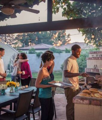 friends bbq in the backyard